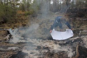 Karl marking the paper with cooled ash. Bimblebox Nature Refuge, September 2012.
