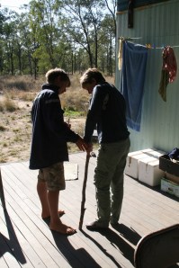 Karl making a crutch for Jill's twisted ankle, photo Glenda Orr